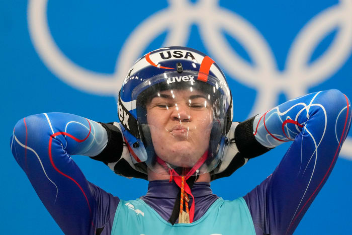 Before a race, Britcher counts down the time until she will feel warm again.